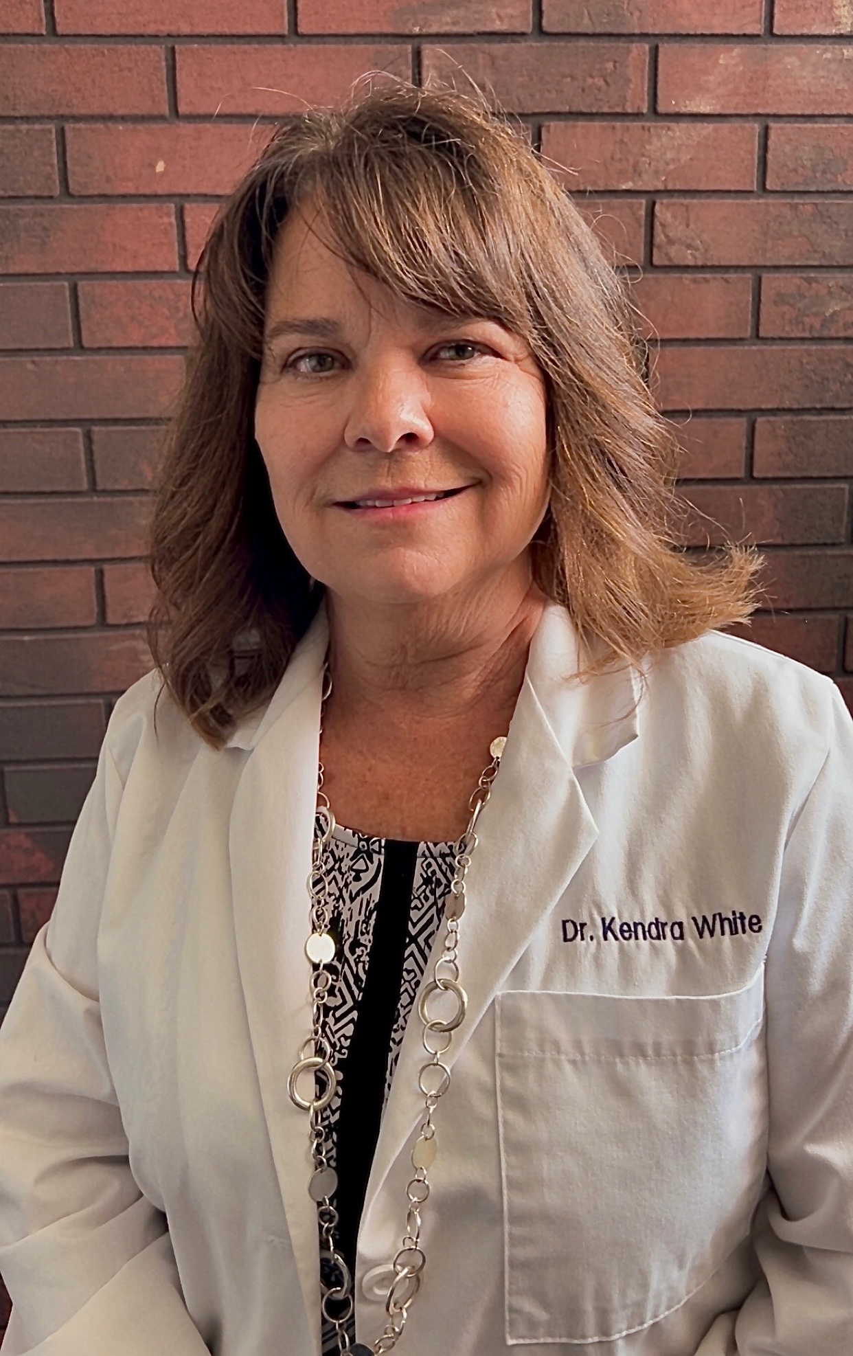 Dr. Kendra Kaesberg-White