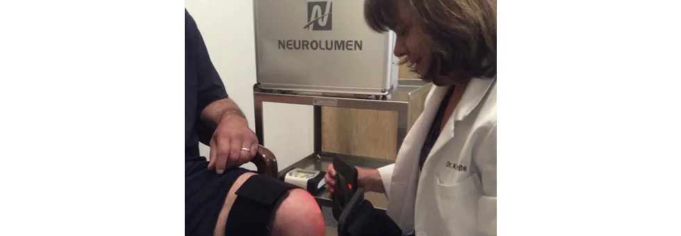 Dr. Kendra Kaesberg-White using Neurolumen therapy