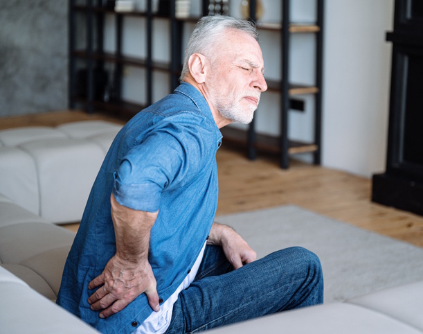 Old man with back pain